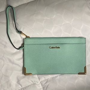 Calvin Klein mint green wristlet.
